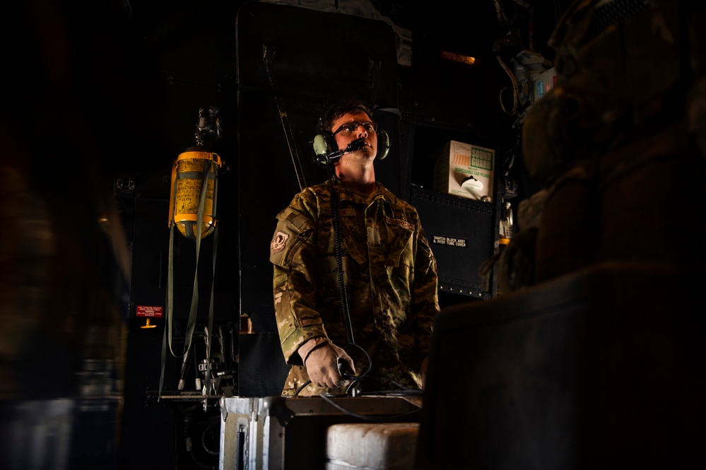 Loadmasters and pararescuemen work hand in hand