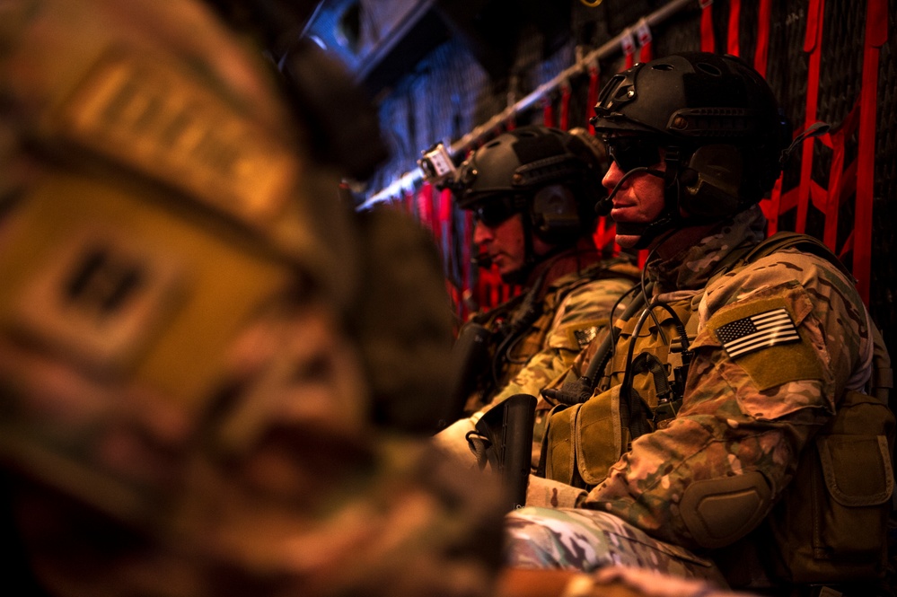 Loadmasters and pararescuemen work hand in hand