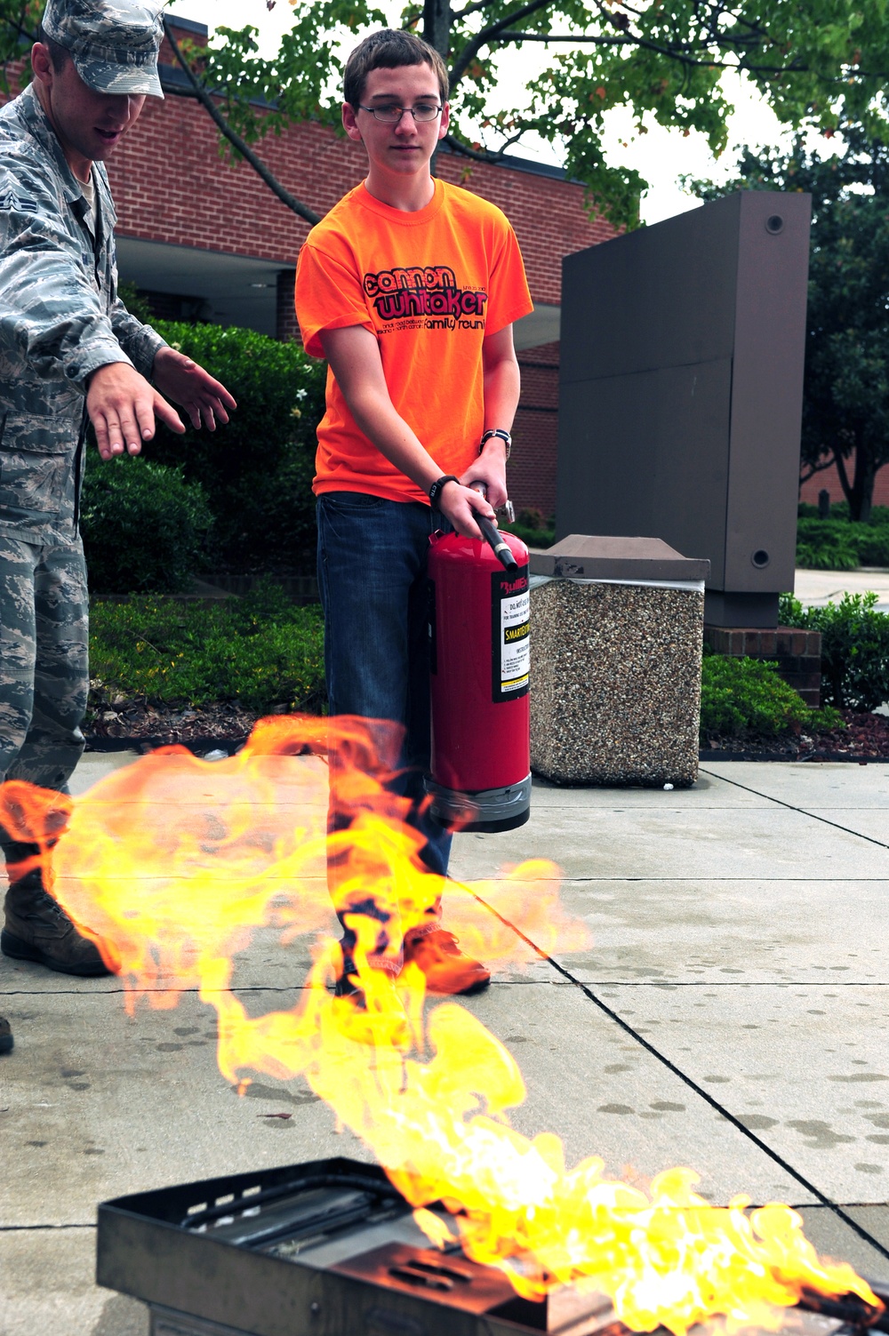 Firefighters pass the torch during Fire Prevention Week