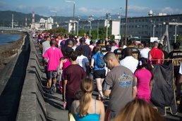 Survivor walks to raise breast cancer awareness