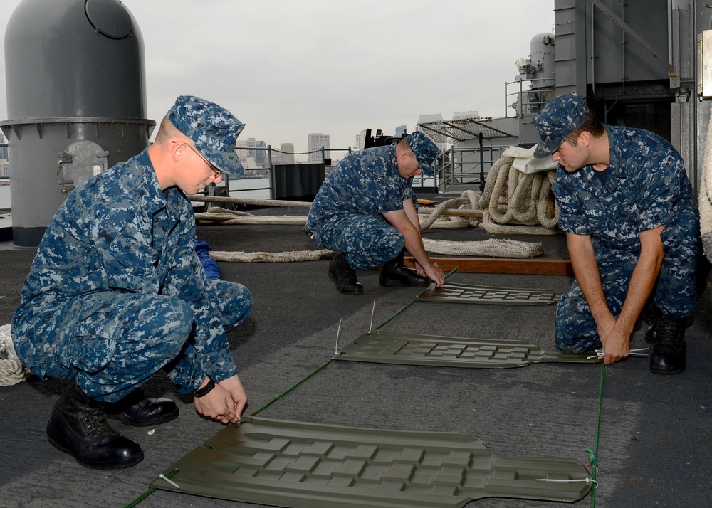 USS Ronald Reagan sailors at work