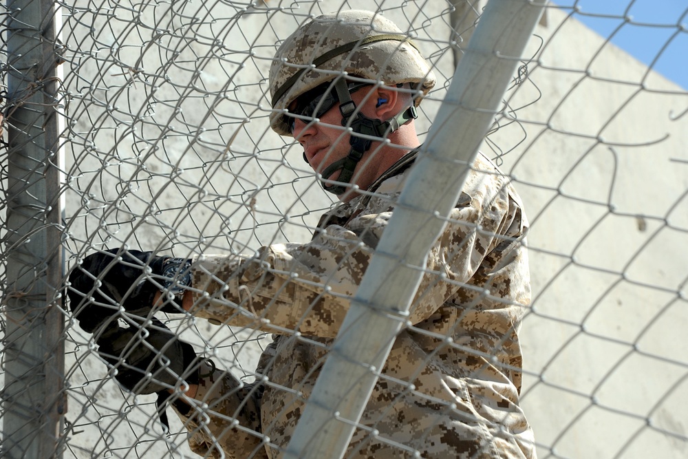 Seabees repair fence