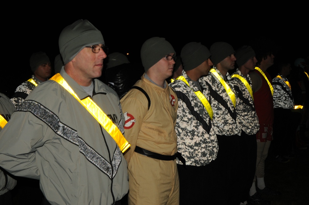 1-40th CAV (A) paratroopers stand in formation before Halloween 'Fun Run'