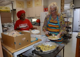 Nile C Kinnick holds Terra Nova breakfast