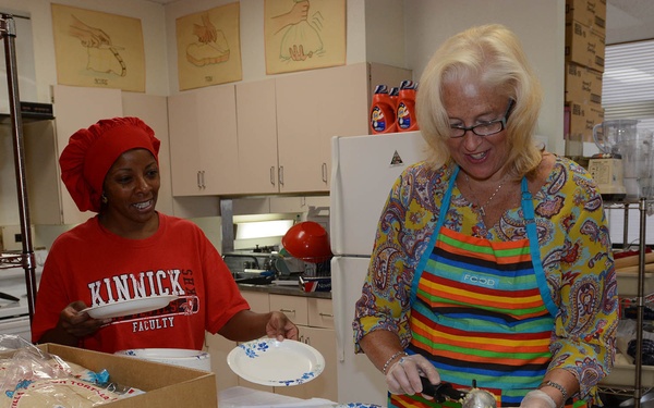 Nile C Kinnick holds Terra Nova breakfast