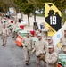 38th Marine Corps Marathon flanked by supporters