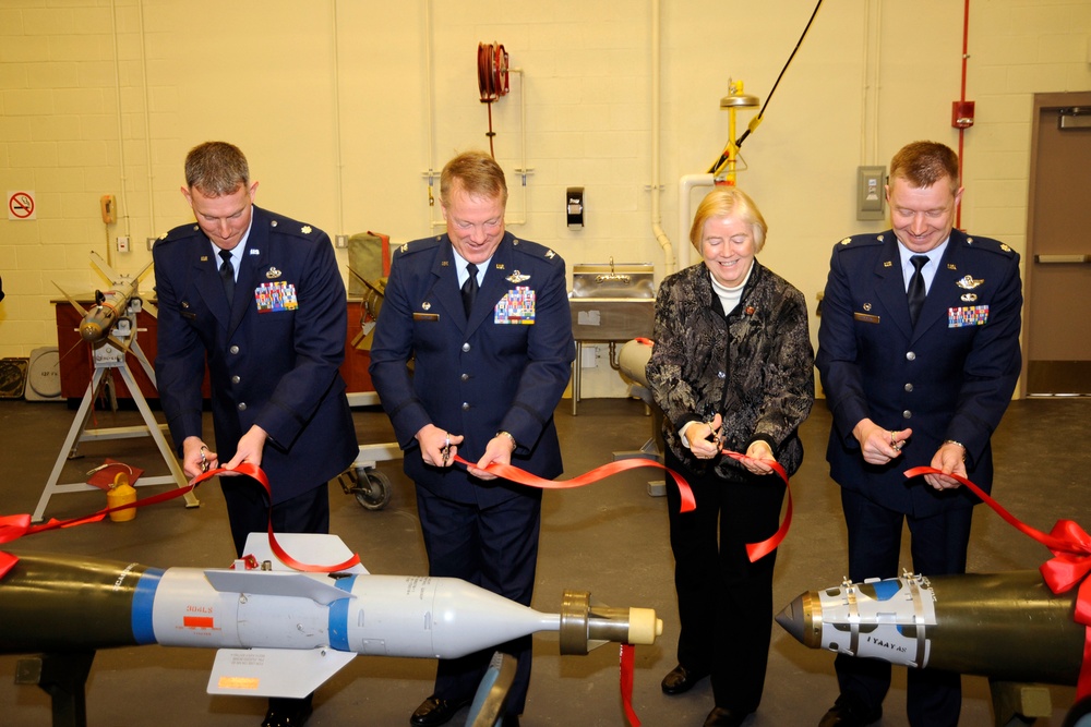 Munitions ribbon cutting