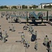 Airman and civilian employees, perform a Foreign Object Debris (FOD) Walk