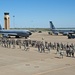 Airman and civilian employees, perform a Foreign Object Debris (FOD) Walk