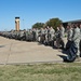 Airman and civilian employees, perform a Foreign Object Debris (FOD) Walk