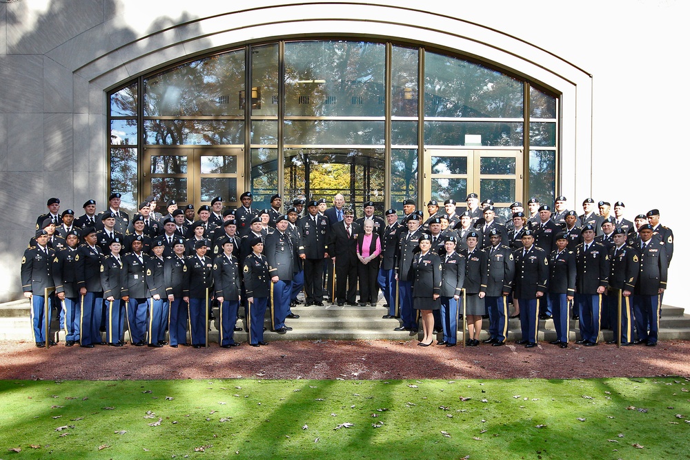 Army Reserve soldiers take group photo with US Army World War II veteran