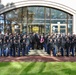 Army Reserve soldiers take group photo with US Army World War II veteran