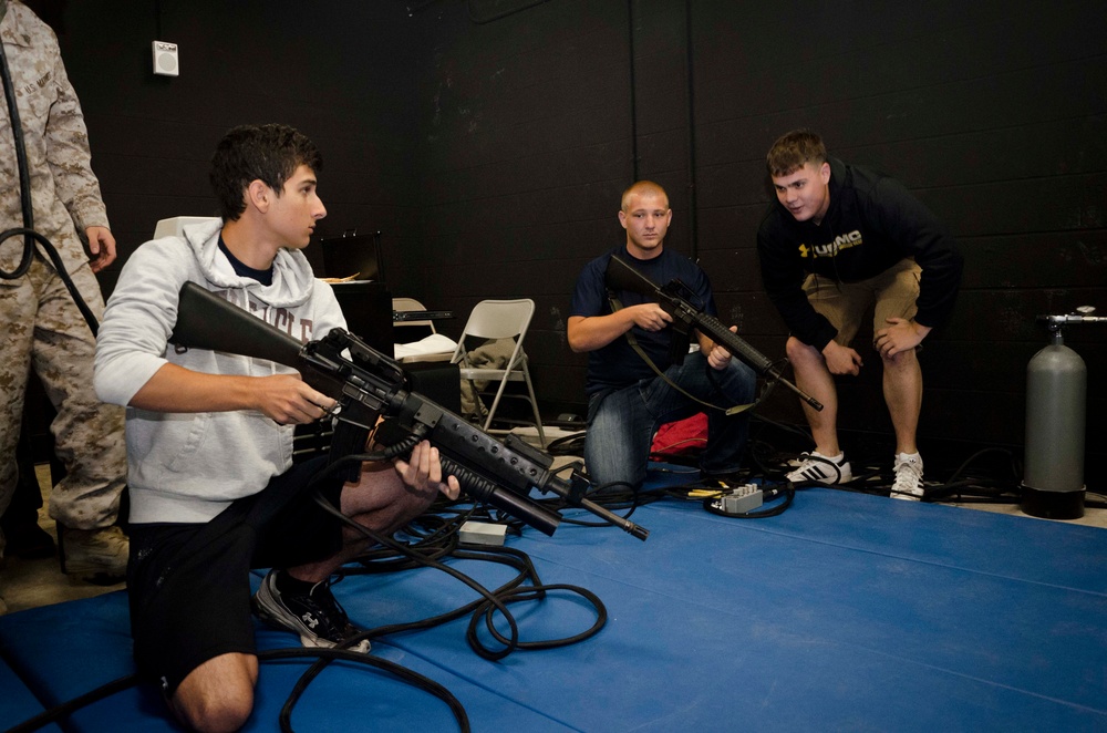 Marines show Poolees weapons handling and combat simulation