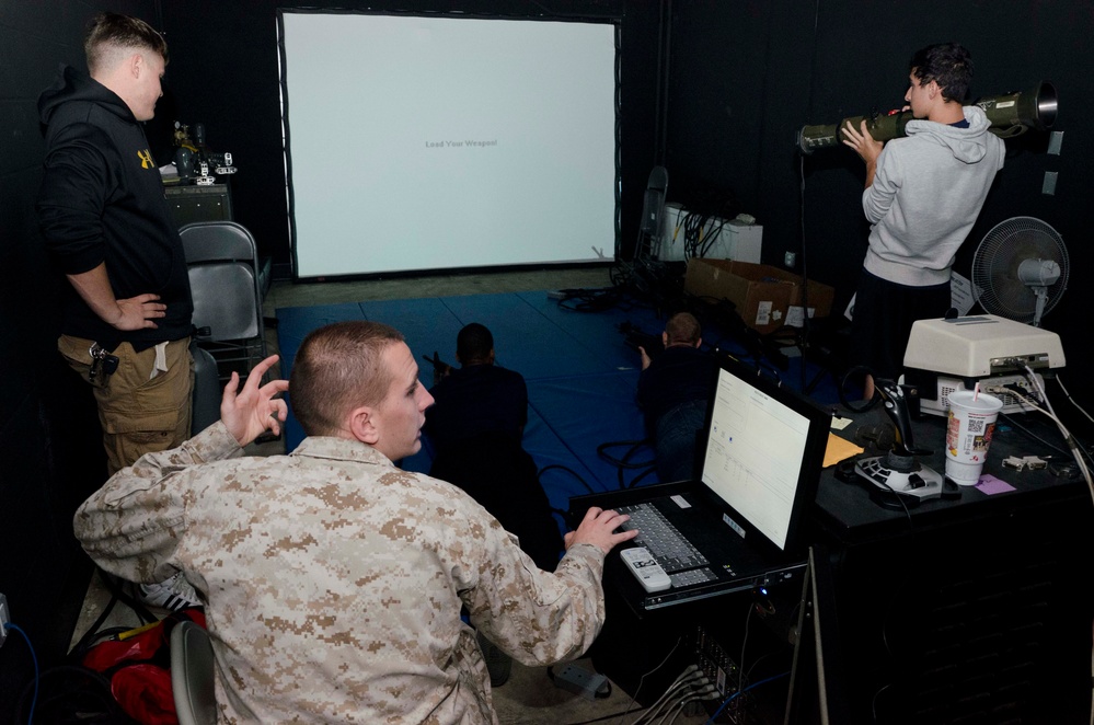 Marines show Poolees weapons handling and combat simulation