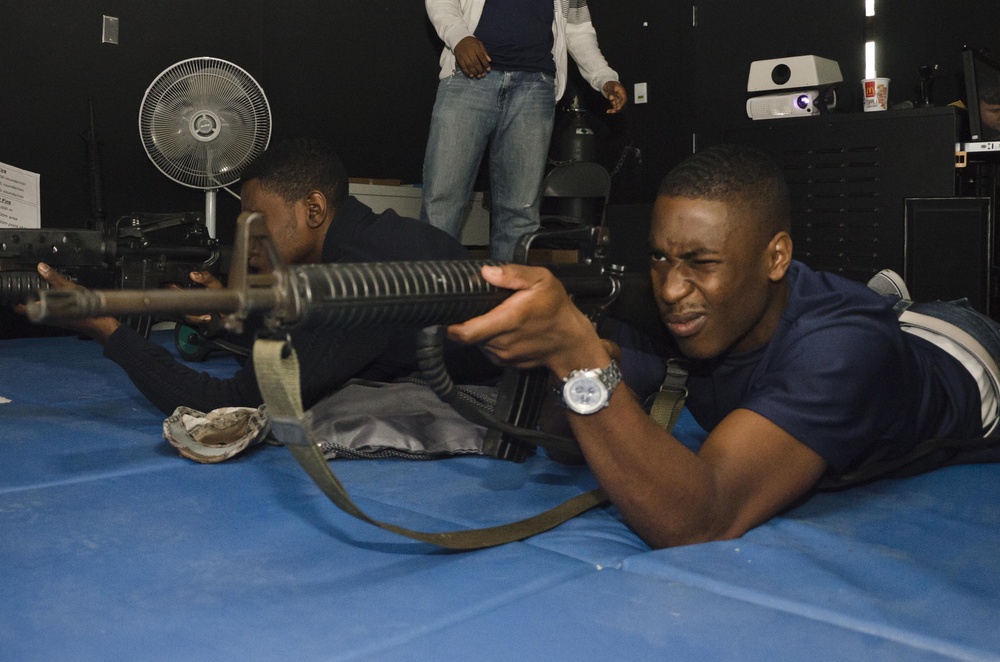 Marines show Poolees weapons handling and combat simulation