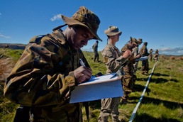 Three different uniforms train to identify IEDs during SK13