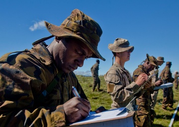 Three different uniforms train to identify IEDs during SK13