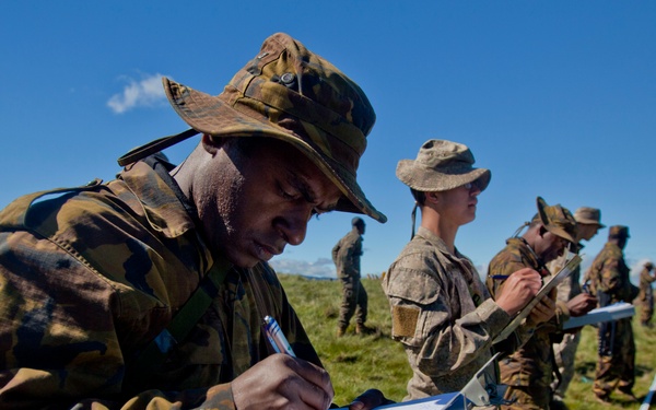 Three different uniforms train to identify IEDs during SK13