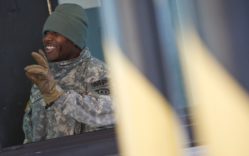 Gate guard greets with a smile