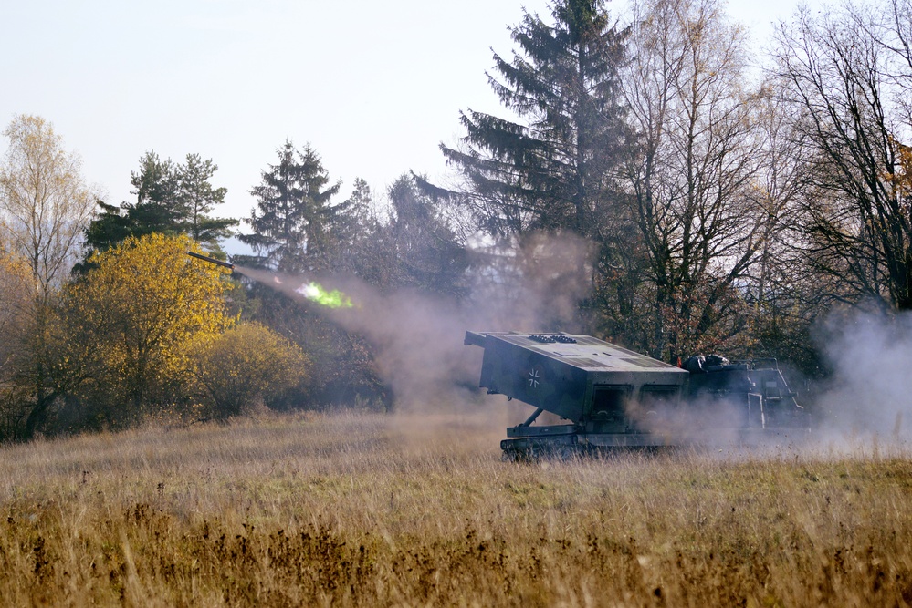 German Army soldiers assigned to 3/132 Rocket Artillery Battalion fire  Multiple Launch Rocket Systems