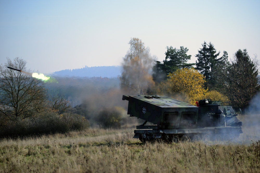 German Army soldiers assigned to 3/132 Rocket Artillery Battalion fire  Multiple Launch Rocket Systems