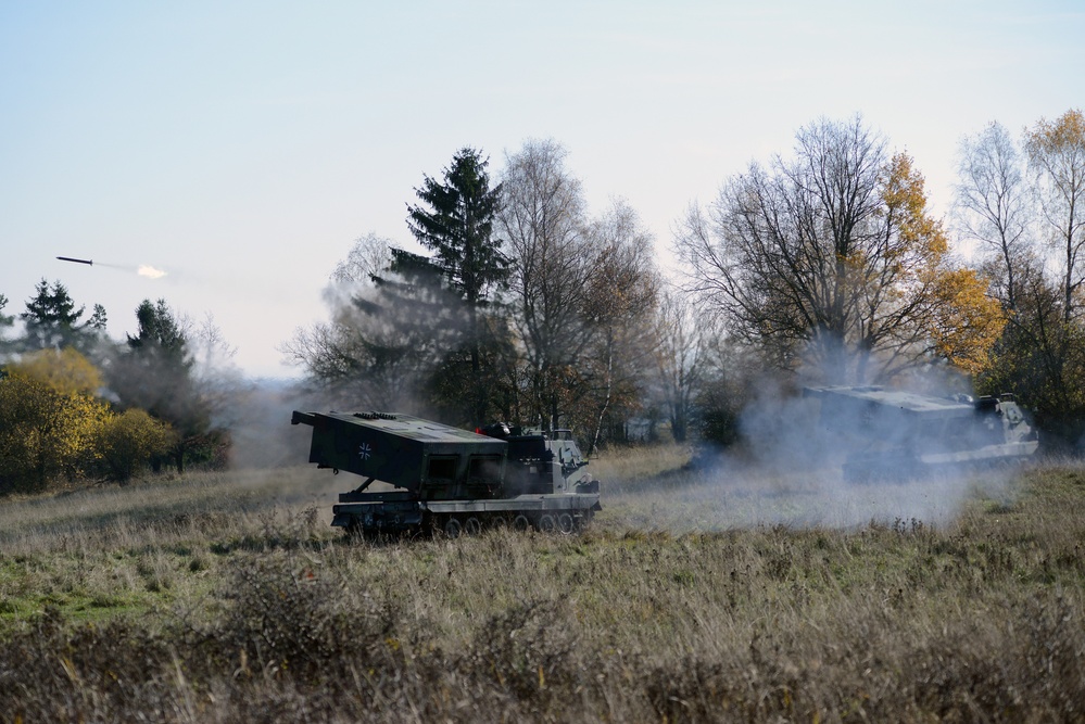 German Army soldiers assigned to 3/132 Rocket Artillery Battalion fire  Multiple Launch Rocket Systems