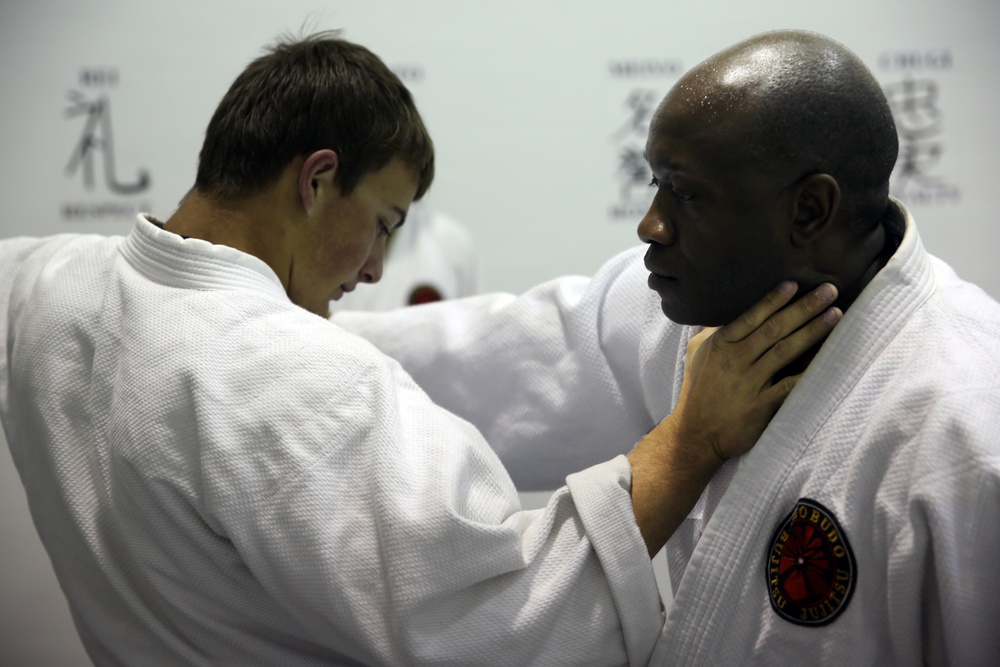Jujitsu students prove strength through pain