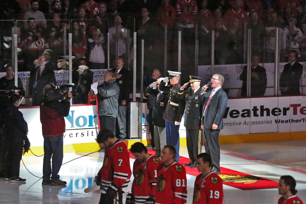 Salutes rendered during national anthem at Chicago Blackhawks game