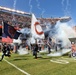 Army Reserve soldier leads Chicago Bears onto the field during game