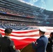 100 service members unfurl American flag at Chicago Bears game
