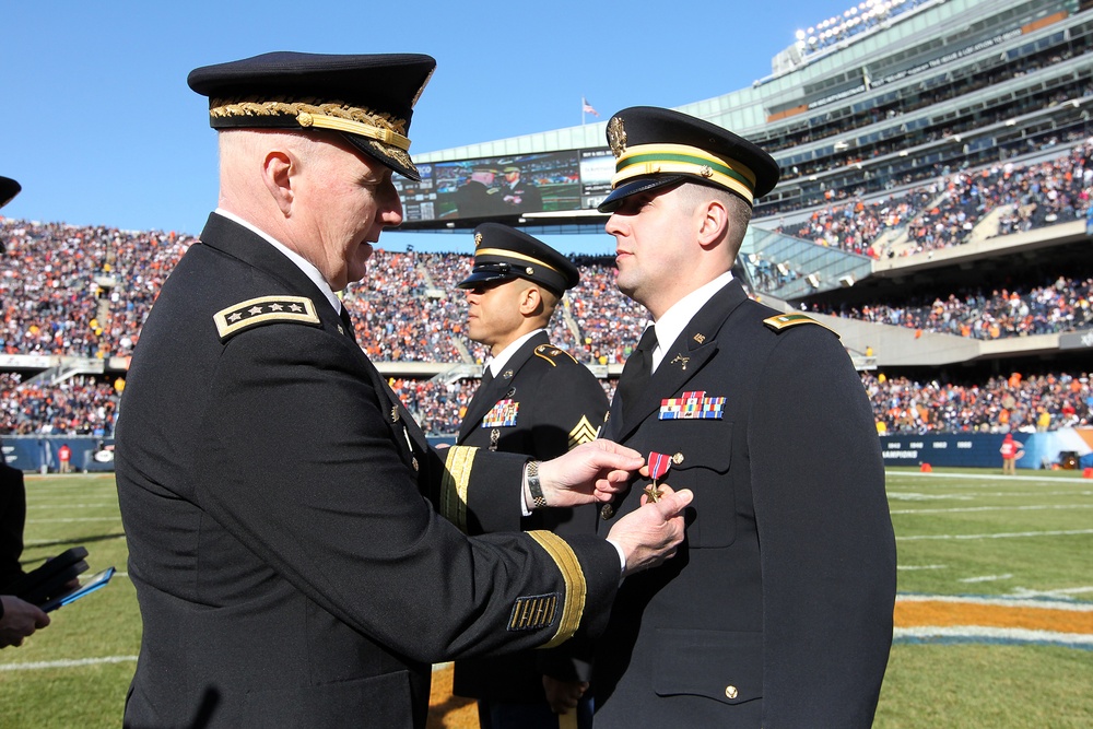 US Army general awards Bronze Stars during Chicago Bears game