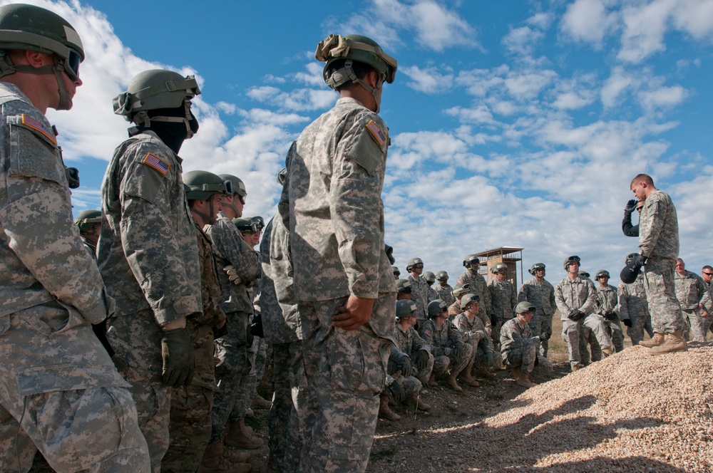 Students at Fort Hood Air Assault School get briefed before sling load testing