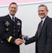 Maj. Gen. David Conboy and Paul K. Kearns shake hands after Veterans Day speech