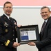 Paul Kerns presents Maj. Gen. David Conboy with a plaque