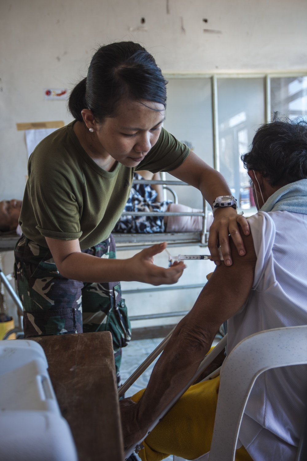 Multi-national relief aid in Tacloban during Operation Damayan