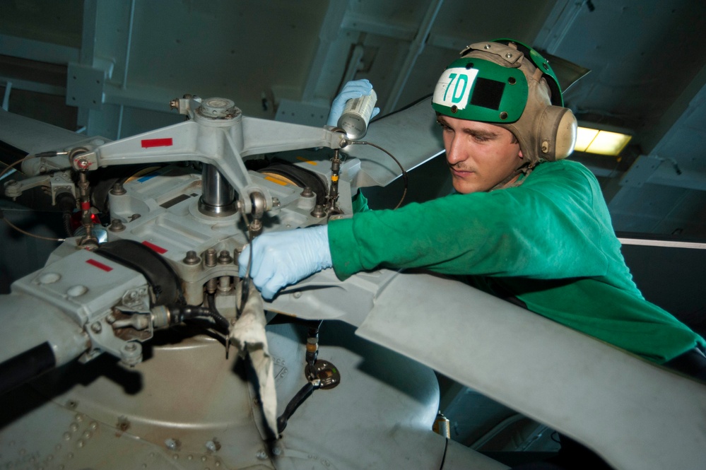 USS Harry S. Truman sailor at work