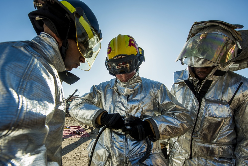 376th Air Expeditionary Wing performs joint vehicle training with Transit Center Manas Airport firefighters