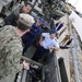 US Coast Guard liaison officers during a visit to Navy Expeditionary Combat Command