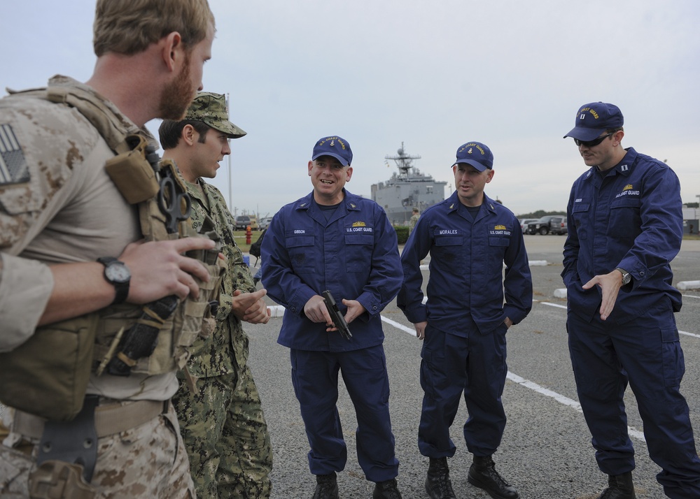 US  Coast Guard liaison officers during a visit to Navy Expeditionary Combat Command