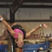 In pursuit of success: Gymnast's grit, determination opens doors of opportunity