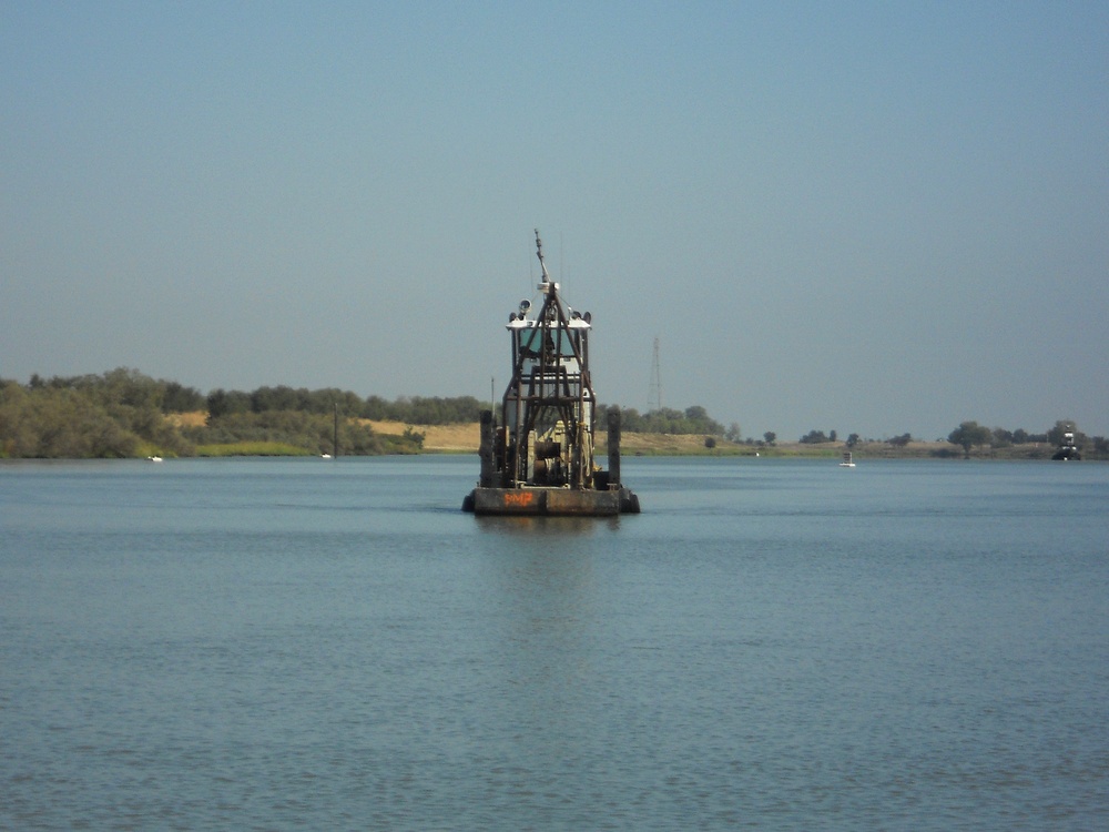 A dredge contracted by the US Army Corps of Engineers Sacramento District