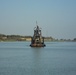 A dredge contracted by the US Army Corps of Engineers Sacramento District