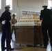 U.S. Marine Brig. Gen. Lori E. Reyonolds cuts the Marine Corps birthday pageant cake