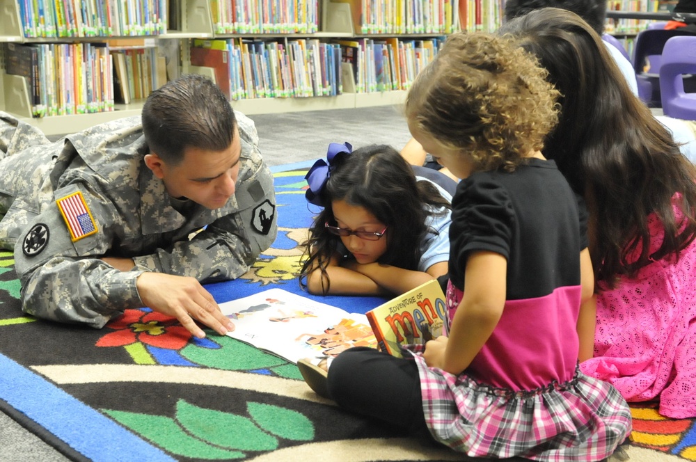 US Army Reserve soldier reads to children