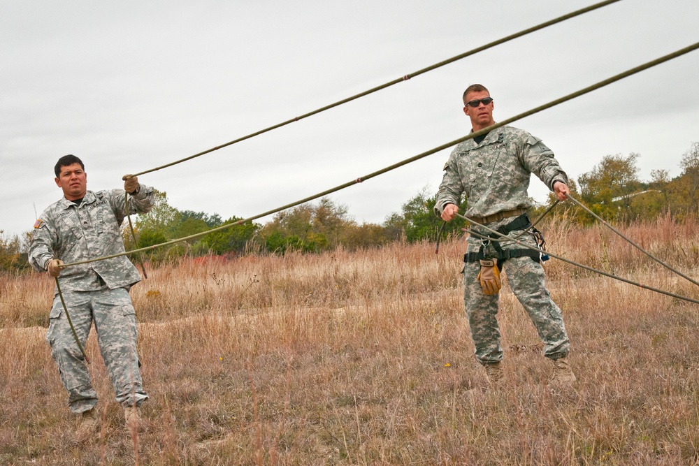 Fort Hood Air Assault School cadre members inspect rappel ropes