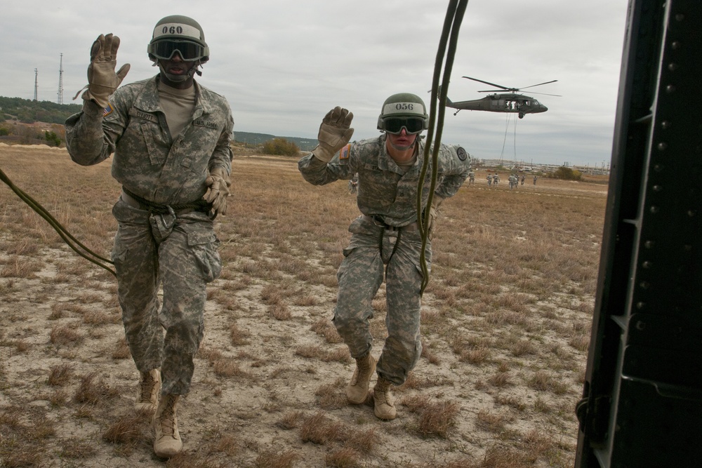 Air Assault School students in phase three rappel testing