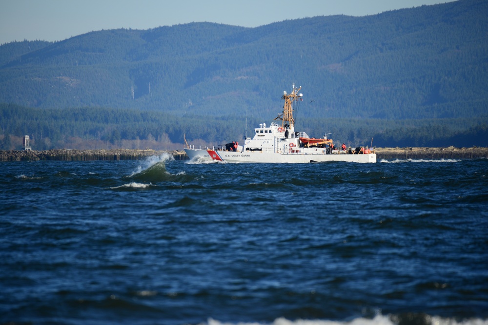 CGC Orcas departing the Columbia River