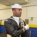 Navy Ceremonial Guardsman prepares uniform