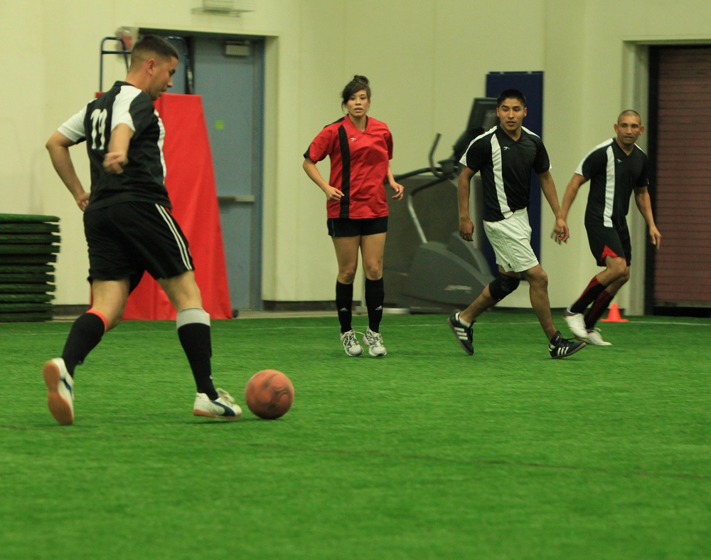 Combat Center soccer players face off in indoor soccer league