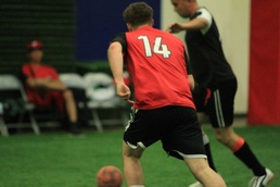 Combat Center soccer players face off in indoor soccer league